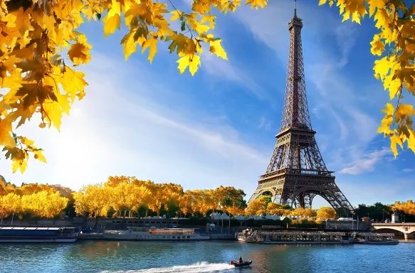 Seine and Eiffel Tower in autumn during sunrise in Paris