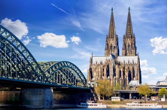 Cologne Cathedral and bridge on a beautiful summer day in Cologne, Germany