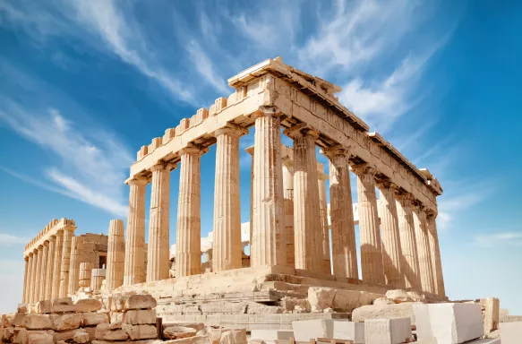 The Parthenon, a white marble temple on a bright day in Athens, Greece