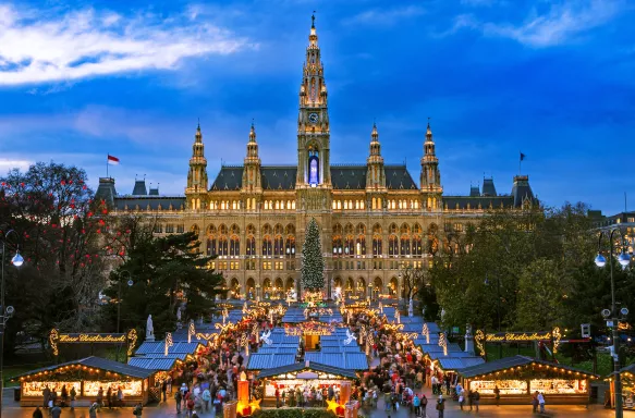 Traditional Christmas market at Vienna Town Hall at night in front of town hall