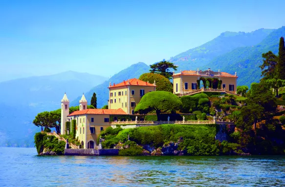 View of Villa del Balbianello building from Lake Como in Italy