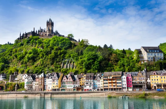 Imperial Castle on mountain with houses overlooking Mosel river in Cochem, Germany