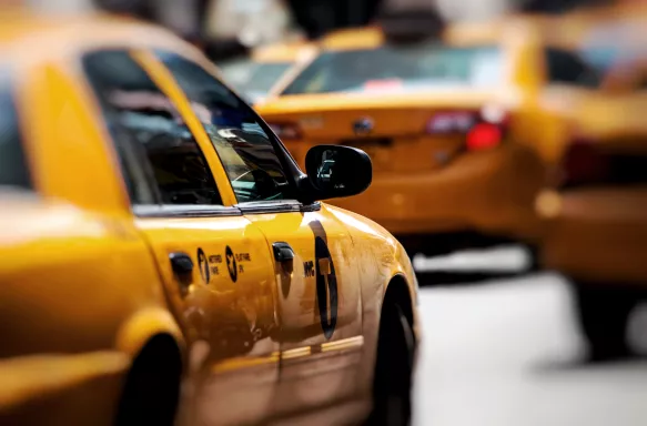 Close-up of yellow taxi cabs in New York City