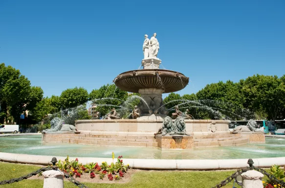 Big fountain in the middle of the French city Aix-en-Provence