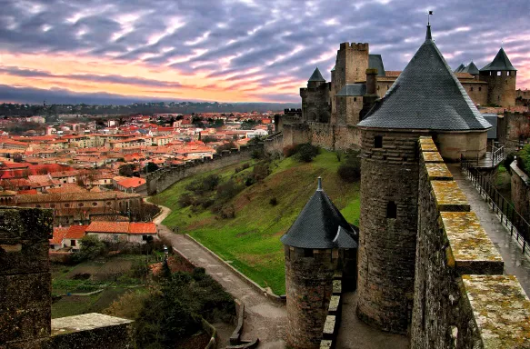 Fortress Cité de Carcassonne battlement walls overlooking the city in Aude, France