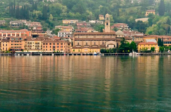 View of the town of Salo in the background alongside the waters Lake Garda