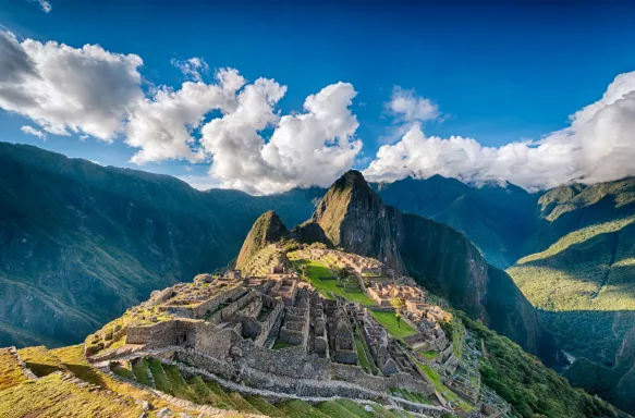 An aerial view of Historic Sanctuary of Machu Picchu and the surrounding peaks