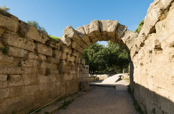 Entrance archway leading to the ancient Olympia Stadium in Greece