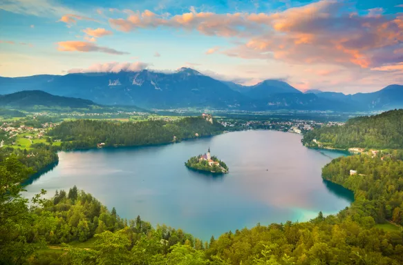 Julian Alps and Lake Bled with St. Marys Church on small island in Slovenia, Europe