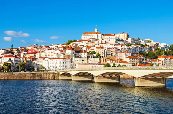 View of Coimbra city from the Mondego River in Portugal