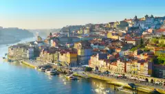 Aerial skyline shot of the colourful buildings in Porto Old Town in sunset light, Portugal.