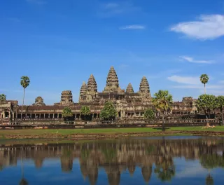 Angkor Wat temple complex being reflected in the water in Cambodia, Southern Asia