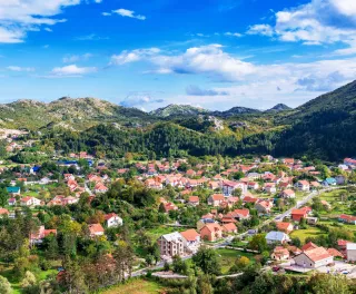 Aerial shot of country houses in Cetinje city, Montenegro