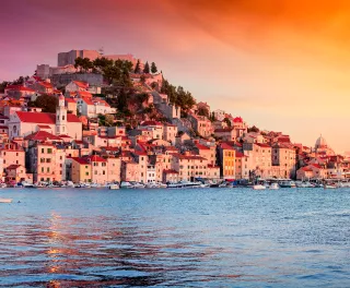 Beautiful sunset across the hilltop city of Sibenik in Croatia