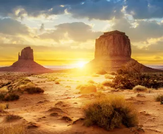 Sunset at the sisters in Monument Valley, USA