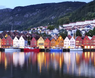 Colourful city of Bergen illuminated at night in Norway