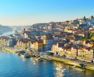 Aerial skyline shot of the colourful buildings in Porto Old Town in sunset light, Portugal.