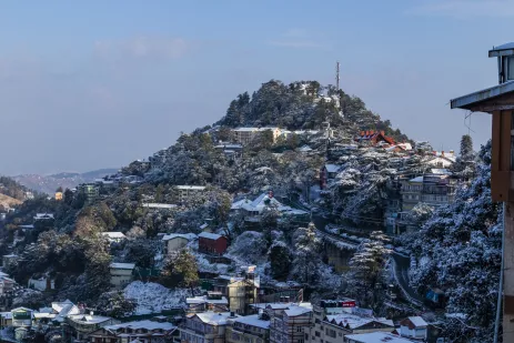 Snowfall on the roofs of buildings in Shimla, India.